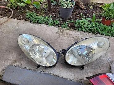 vgate: DESNI FAR NISAN MICRA | desni far nisam micra — 1