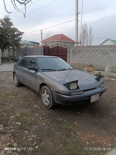 Mazda: Mazda 323: 1991 г., 1.6 л, Механика, Бензин, Хэтчбэк — 16