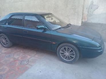 дополнительный помпа: Mazda 323: 1992 г., 1.6 л, Бензин — 6