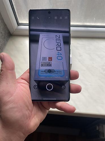 ev telefonları: Infinix Zero 40, 256 GB, rəng - Göy, Sensor, Face ID — 7