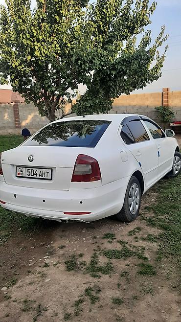 roewe rx5: Skoda Octavia: 2012 г., 1.6 л, Автомат, Бензин, Седан — 4