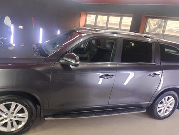 шины размер 14: SsangYong Rexton – это полноразмерный внедорожник тёмно-серого цвета