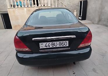 1997 nissan sunny: Nissan Sunny: 1.3 l | 2005 il Sedan — 10