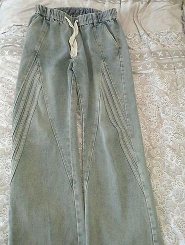 Джинсы и брюки: Yüngül mavi rəngli denim şalvar Geyinilmeyib 36 razmer di 33 — 1