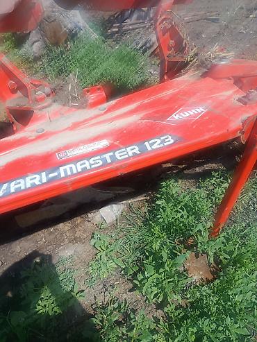 опора: Оборотный навесной плуг KUHN Vari-Master 123 - Производитель: KUHN — 2