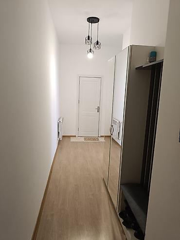 kupca: 2 otaqlı, Yeni tikili, 69 kv. m — 1