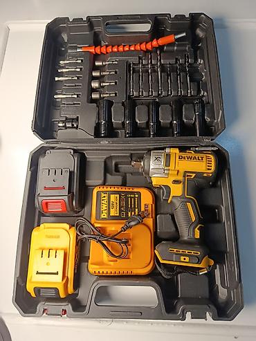 Оборудование для бизнеса: Аккумуляторный ударный гайковёрт DeWALT XR в кейсе с полным набором — 1
