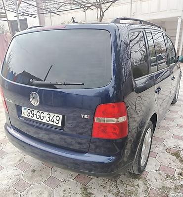 фольксваген тигуан л с: Volkswagen Touran, tünd mavi rəng, 5 qapılı kompakt miniven. - Geniş — 7