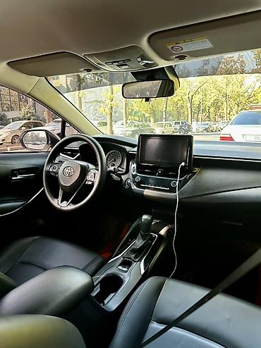 Toyota: Toyota Corolla: 2022 г., 1.8 л, Вариатор, Гибрид, Седан — 5