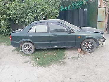 номера рф: Mazda 323: 2013 г., 1.5 л, Автомат, Бензин, Седан — 1