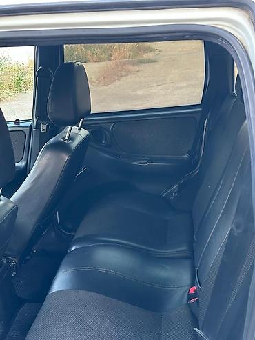 ravon r4 arenda: Chevrolet Niva – kompakt və çevik 4x4 krossover - Kuzov: ağ rəng, tam — 2