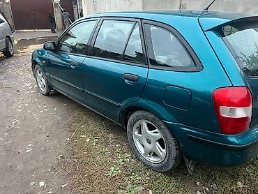 бампер виндом: Mazda Familia: 1999 г., 1.5 л, Автомат, Бензин, Седан — 5