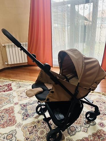 коричневые: Прогулочная коляска Anex (цвет бежевый) - Легкая и маневренная рама — 1