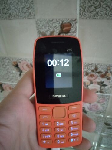nokia 2168: Nokia C210, rəng - Narıncı, Düyməli, İki sim kartlı