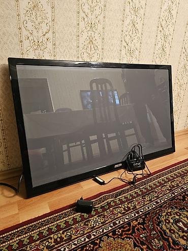 dvd rec: Samsung televizor (təxmini 46–50") – LED panel, nazik çərçivə dizaynı — 2