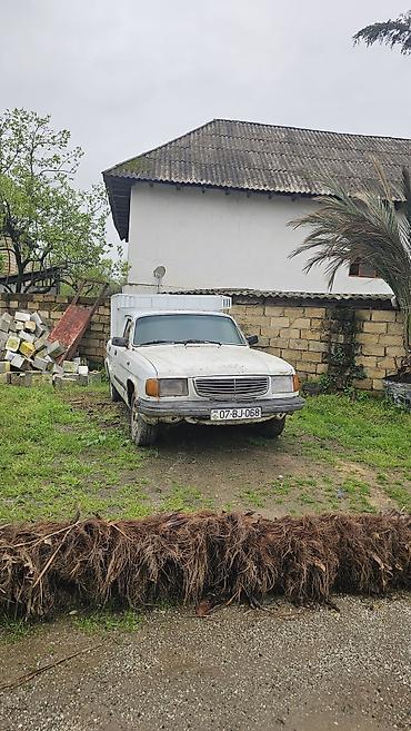 QAZ: QAZ 3110: 2.4 l | 1998 il Sedan — 11