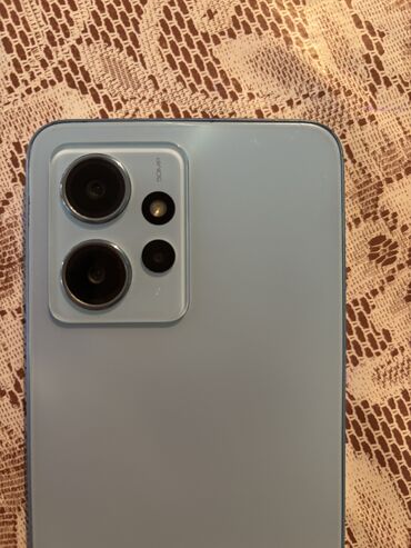 телефон флай стратус 8: Xiaomi 12, 4 ГБ, цвет - Голубой, 
 Отпечаток пальца, Две SIM карты, Face ID
