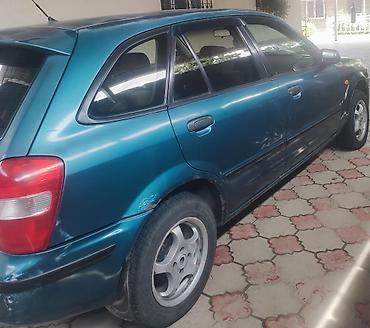 323 f: Mazda 323: 1998 г., Автомат, Бензин, Хэтчбэк — 1