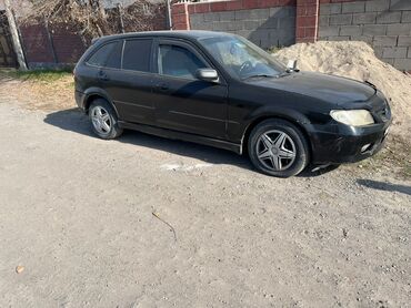 обмен на авто с доплатой: Mazda 323: 2002 г., 1.3 л, Механика, Бензин, Хэтчбэк