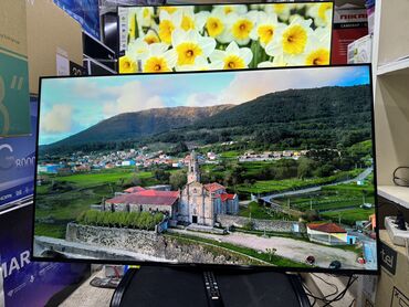 Телевизоры: Телевизор TCL 50V6B, LED, черный Описание Используйте голос для — 14