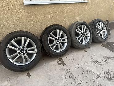 114: Комплект из 4 колес Hyundai: легкосплавные диски с шинами. 2 балона — 1