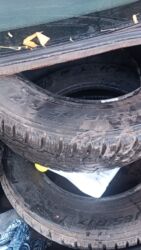 шипованные шины: Шины 215 / 65 / R 17, Зимняя шипованная, Б/у, Комплект, Легковые, Bridgestone