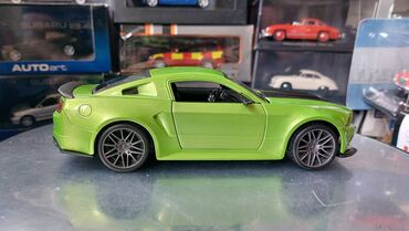 Avtomobil modelləri: Коллекционная модель Ford Mustang Street Racer Green black 2014 — 12