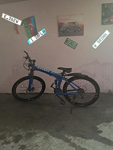 İdman velosipedləri: Dağ velosipedi – mavi rəng, 26" təkərlər Xüsusiyyətlər: - Alüminium — 1