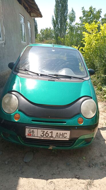кредит на машину: Автомобиль Daewoo Matiz зеленого цвета, компактный городской хэтчбек