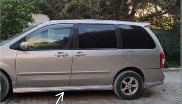 брызговики универсальный: Наружные накладки порогов Mazda, 2002 г., Оригинал