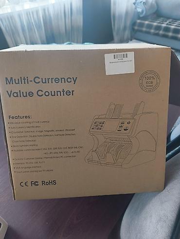 100 доллар: Счетчик банкнот Multi-Currency Value Counter (модель на коробке — 1