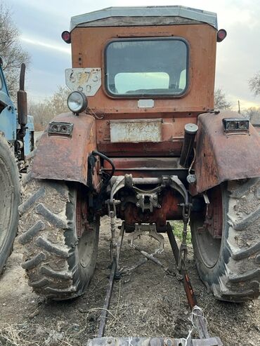 Тракторы ЛТЗ: Трактор колесный, кабина закрытая. Основные характеристики и — 7