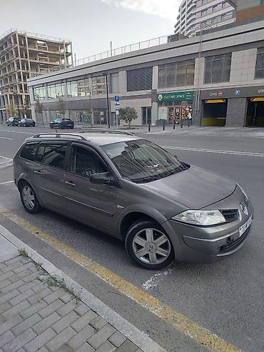 Renault: Renault Megane Grandtour (universal), boz rəng. Əsas xüsusiyyətlər: - — 2