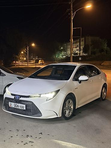 crv 2001: Toyota Corolla: 2022 г., 1.8 л, Вариатор, Гибрид, Седан — 2