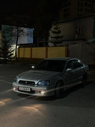 полик на форестер: Седан Subaru Legacy в серебристом цвете, модель 2002 года. Автомобиль