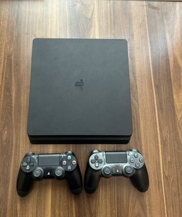 сони плейстейшен 3: Sony PlayStation 4 Slim oyun konsolu Paket tərkibi: - PS4 Slim (qara