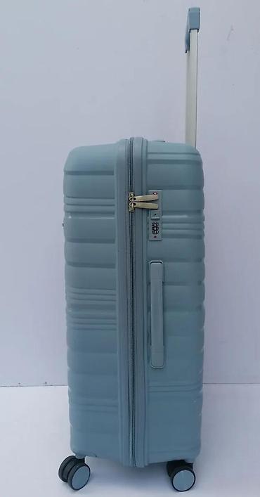 Putni koferi i torbe: Tvrdi kofer na točkiće – svetloplava boja - Materijal: čvrsta — 8