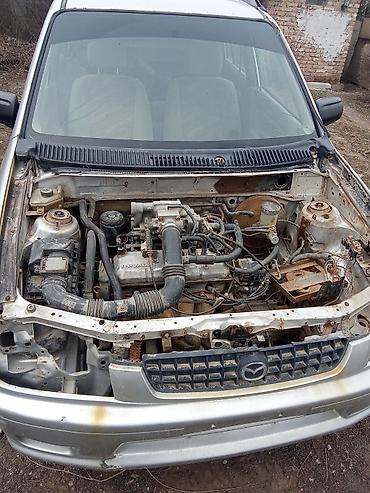 mazda 323 мотор: Mazda 323/Familia (около конца 90-х – начала 2000-х), серебристый — 1
