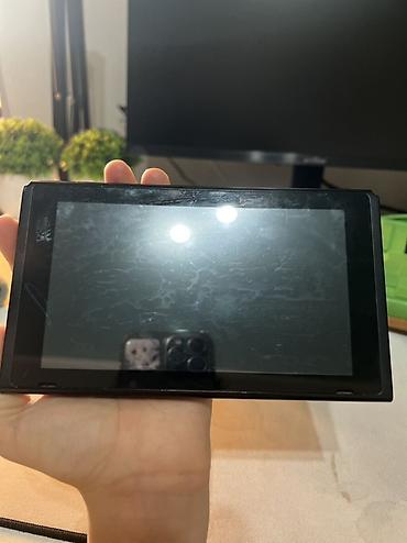 Nintendo Switch: Nintendo Switch (модель с док-станцией) Комплектация: - консоль — 4