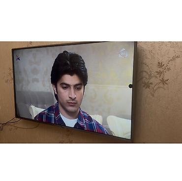 Lg tv 49uj ( 49 ekrandı ) Ekranda ləkə var şəkillərdə hərşey aydın