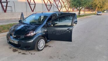 Toyota: Toyota Aygo: 1 l. | 2009 έ. Χάτσμπακ — 12