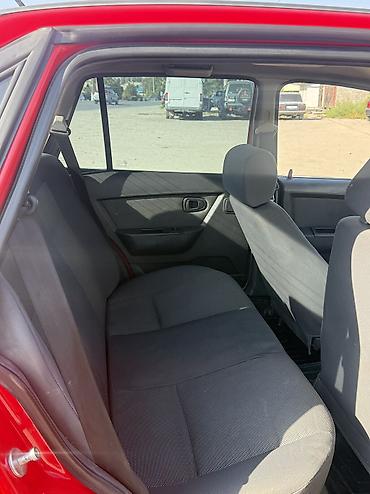 нур мото: Daewoo Nexia: 2009 г., 1.5 л, Механика, Бензин, Седан — 6
