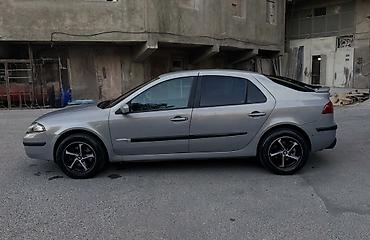 Renault: Renault Laguna sedan Mashin tam olaraq zavoddur. Vurugu, udari deyisen — 3