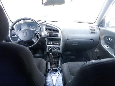 rox 01: Kia Spectra: 2003 г., Седан — 6