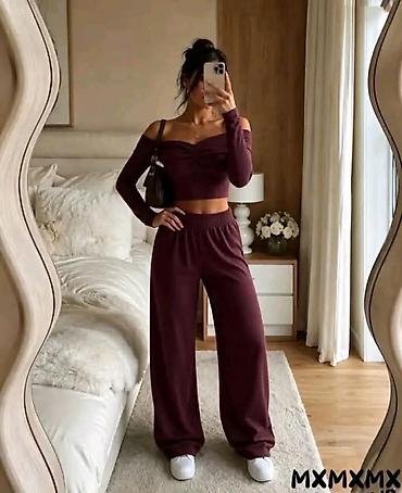 DvodelnI ženski komplet – top i široke pantalone - Dizajn: moderan