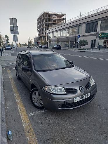 Renault: Renault Megane Grandtour (universal), boz rəng. Əsas xüsusiyyətlər: - — 1