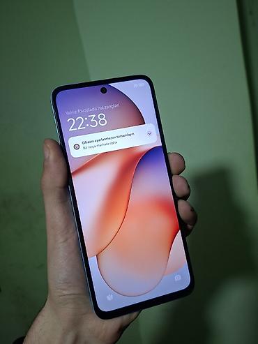 Redmi: Məhsul: Redmi smartfon - Rəng: Açıq mavi - Korpus: Düz (flat) kənarlı — 9