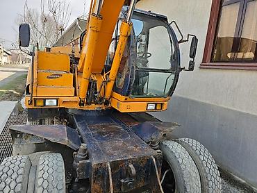 Экскаваторы: Экскаватор, Samsung, 1998 г., Колесный — 14