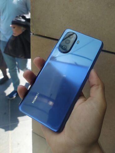 сотовый телефон fly ff244: Huawei Nova Y70, 128 ГБ, цвет - Голубой, Отпечаток пальца, Face ID