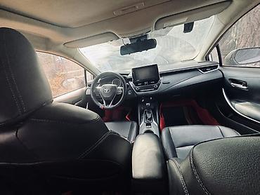 byd e1: Toyota Corolla: 2021 г., 1.8 л, Вариатор, Гибрид, Седан — 10